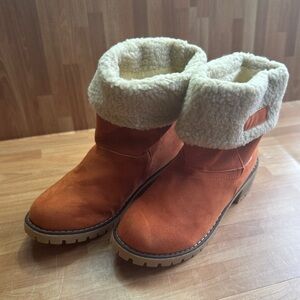 Orange suede like heeled booties with Sherpa like trim size 8.5